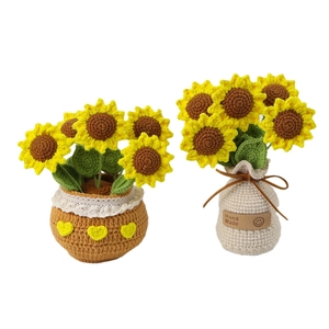 Handmade crochet sunflower potted plants with exquisite knit texture on white background
