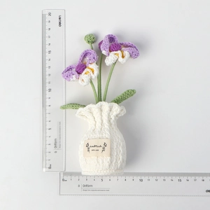 Handmade crochet orchid height measurement at 18cm with purple petals and white vase