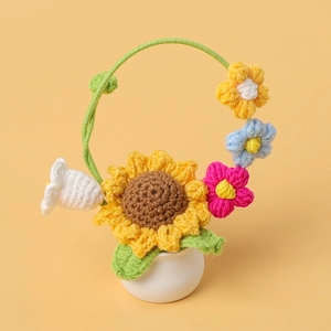 Panier de tournesols au crochet fait main dans un vase en céramique pour décor