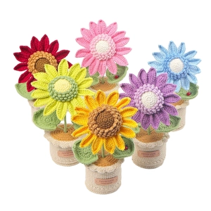 Handmade crochet sunflower potted plants in six vibrant colors for desktop decor