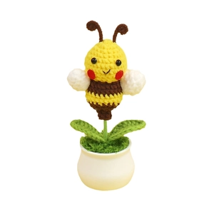 Handmade crochet bumblebee potted plant ornament in white pot for desk decoration