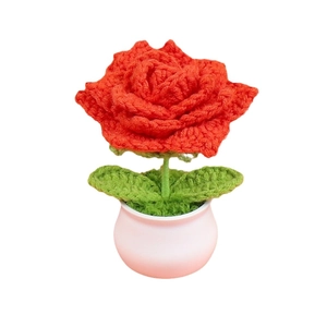 Handmade crochet red rose potted plant decoration with green leaves and white pot