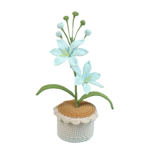 Handmade crochet blue lily potted plant with yellow stamens and a knitted beige pot
