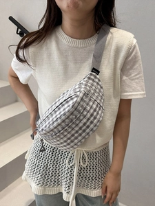 Gray striped canvas waist bag for women with floral embroidery and adjustable strap