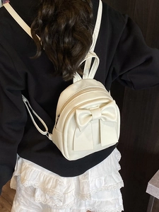 Süßer cremeweißer Damen Mini Rucksack mit großer Schleife und schmalen Trägern