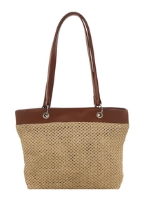 Summer woven straw tote bag with beige fiber texture and brown leather shoulder straps