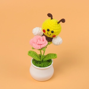 Handmade crochet pink rose and cute bee potted plant for desktop aesthetic decoration