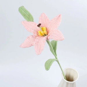 Handmade crochet pink lily flower in white vase for home decor and graduation gifts