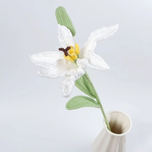 Handmade crochet lily flower bouquet in white ceramic vase for home decoration and gifts