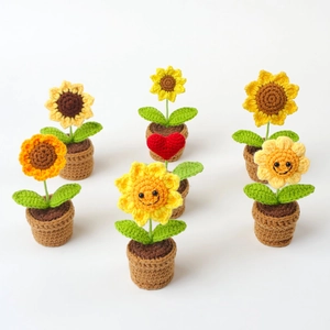 Mini pianta di girasole all'uncinetto fatta a mano con faccina sorridente per decorazione