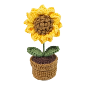 Handmade crochet sunflower car ornament in a brown pot with yellow petals and green leaves