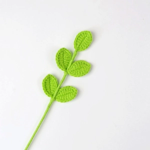 Handcrafted crochet green leaf sprig with five woven petals for bouquet decoration
