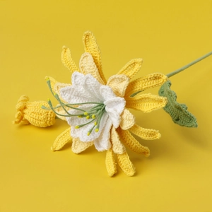 Detail of handcrafted crochet epiphyllum flower with white petals and yellow textures