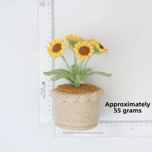 Handmade crochet sunflower potted plant with measurement scale showing 24cm height
