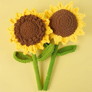 Handmade crochet sunflower bouquet crafted with yellow chenille yarn for home decor