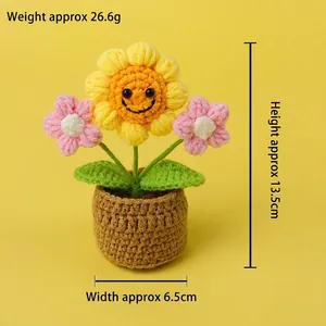 Handmade crochet sunflower potted plant with smiling face for desk decoration