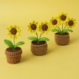 Detailed knit sunflower pot set with handmade crochet textures on a warm yellow background