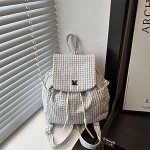 Minimalist black and white checkered drawstring backpack with metal buckle for women