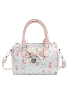 Chic cream-colored Boston bag with cute cartoon prints and pink leather handles