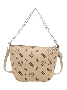 Beige bucket bag met zwarte berenprint en een verstelbare schouderriem