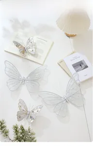 Silberne Netzschmetterlinge mit Pailletten und Perlen für Weihnachtsbaumdekoration