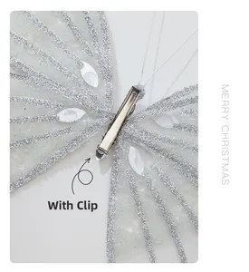 Details von silbernem Netz-Schmetterling mit Glitzerstreifen und einem Metall-Clip