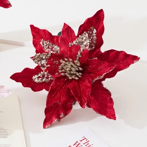 Red velvet Christmas poinsettia flower with silver glitter and golden sequins ornament