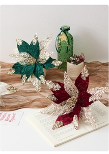 Detail of 28cm Christmas poinsettia with velvet petals and golden glitter mesh leaves