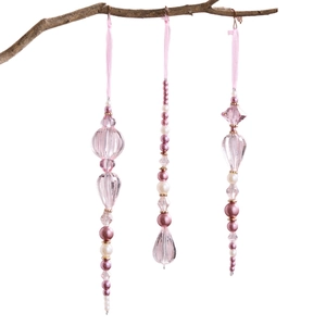 Pink acrylic crystal Christmas tree ornaments with pearls and ribbons on a branch