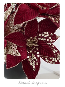 Detail of red velvet Christmas flower with golden glitter and hand-sewn sequins