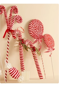 Red and white velvet Christmas candy cane and lollipop ornaments with bells and pine detail