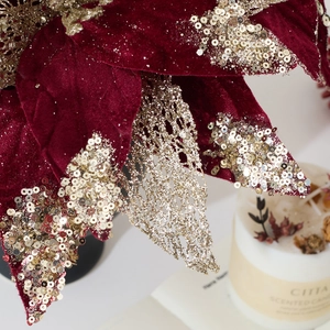 Elegant red velvet artificial poinsettia flower with gold glitter edges for Christmas decor