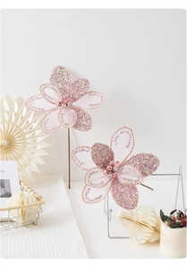 Detail of pink glitter mesh flowers for Christmas trees with beads and stylish decor