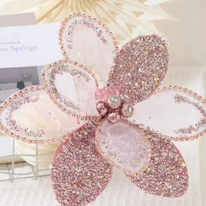 Pink and white mesh flower ornament with sparkling sequins and crystal beads for Christmas decoration
