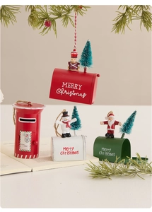 Detailed view of metal Christmas mailbox ornaments with Santa and nutcracker decorations