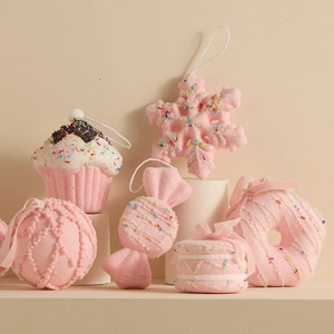 Pink Christmas dessert ornaments set with cupcake, donut, candy and snowflake shapes