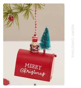 Detail of red Christmas mailbox ornament with Nutcracker and Merry Christmas text