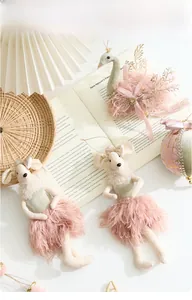 Detailed ballet-themed velvet Christmas ornaments with swan and mice on a white background