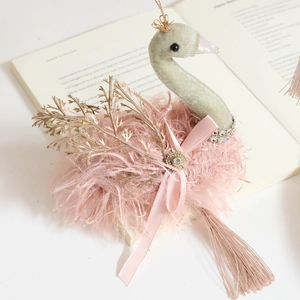 Pink and green velvet swan Christmas tree ornament with feathers and hanging tassel