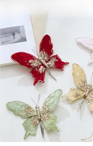 Close-up of elegant fabric butterfly clips with sequins and rhinestones for decor