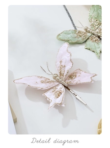 Detail of pink and green velvet butterfly clips with golden glitter and pearl accents
