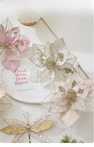 Detailed close-up of 24cm glitter mesh Christmas flowers in pink, white and champagne gold
