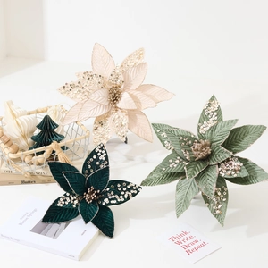 Velvet artificial poinsettia with silver sequins in cream, light and dark green