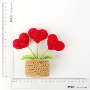 Crochet red heart potted plant decoration showing 10cm height with a measurement ruler