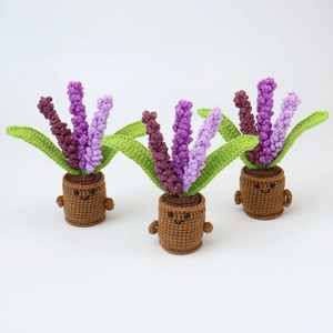Three handmade crochet lavender potted plants with cute faces for home decor