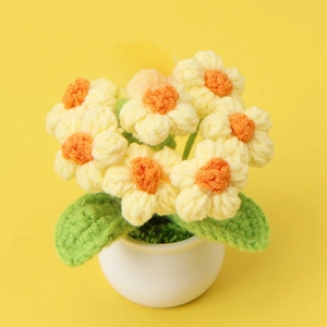 Handmade crochet puff flower in white ceramic pot for home office desk decoration