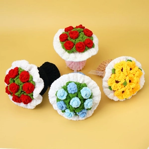 Close-up of handmade crochet sunflower bouquets in various colors with thick chenille yarn