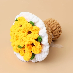 Handmade crochet sunflower bouquet crafted with thick chenille yarn and purple ribbon bow
