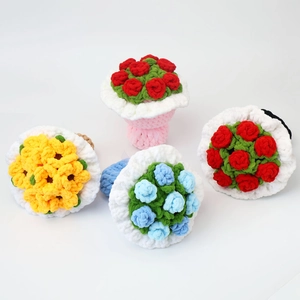 Detailed view of four handmade crochet sunflower bouquets with colorful chenille yarn
