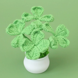 Handmade crochet clover plant in white pot for desk and home office decoration